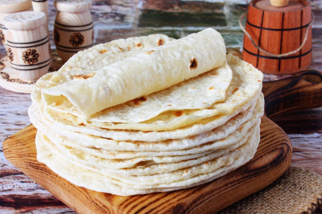 Plain tortillas in a frying pan