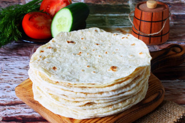 Plain tortillas in a frying pan