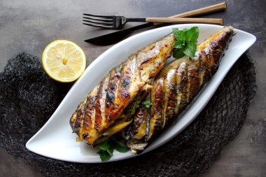 Mackerel kebab on the grill on the grill