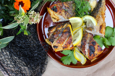 Mackerel kebab on the grill on the grill