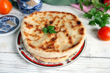 Tortillas with cottage cheese in a frying pan