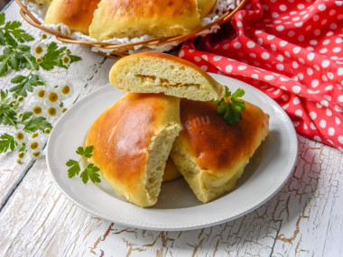 Pies on water in the oven with cabbage