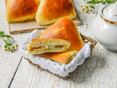 Pies on water in the oven with cabbage