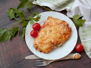 Chop with mushrooms and pork cheese in the oven