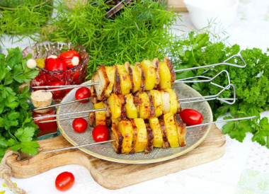 Potatoes on the grill in foil with bacon