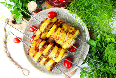 Potatoes on the grill in foil with bacon