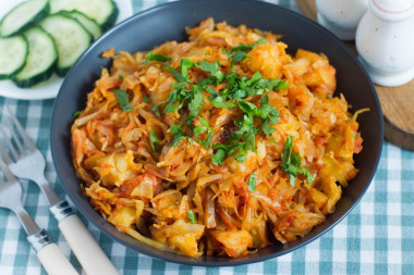 Stewed cabbage with potatoes in a frying pan