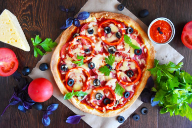 Classic puff pastry pizza in the oven