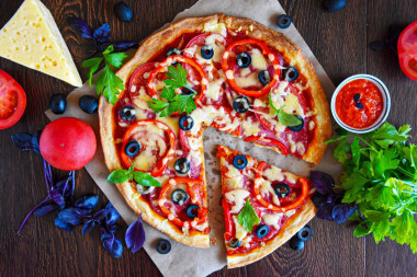 Classic puff pastry pizza in the oven