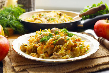 Stewed meat with cabbage and apples