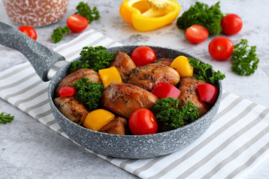 Chicken breasts in soy sauce in a frying pan