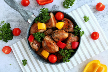 Chicken breasts in soy sauce in a frying pan