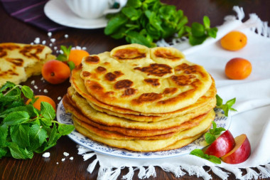 Tortillas with sour cream in a frying pan