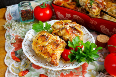 Rabbit stewed in sour cream in the oven