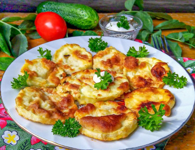 Zucchini with egg in a frying pan