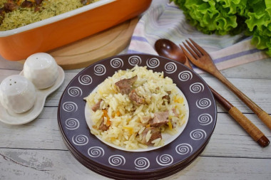 Rice with meat in the oven