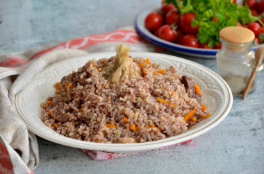 Ferghana pilaf from Uzbekistan in a cauldron