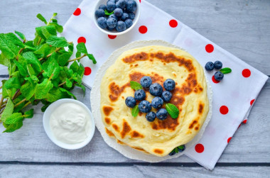 Thick fluffy pancakes on kefir