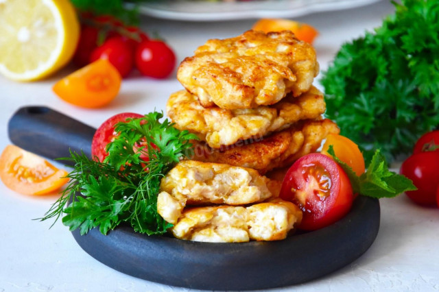 Cutlets in pieces from chicken fillet with mayonnaise in a frying pan