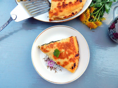 Kefir tortillas in a frying pan with filling