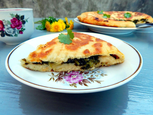 Kefir tortillas in a frying pan with filling