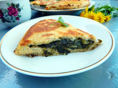 Kefir tortillas in a frying pan with filling