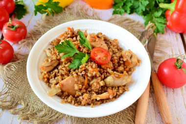 Buckwheat with chicken in a frying pan