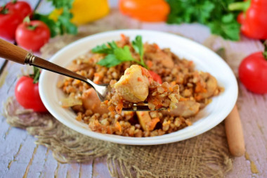 Buckwheat with chicken in a frying pan