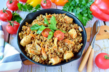 Buckwheat with chicken in a frying pan