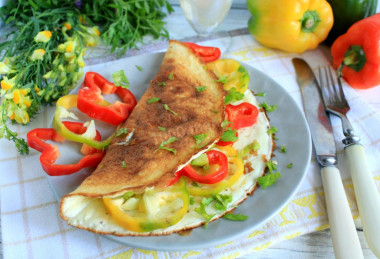 Omelet with flour and milk in a frying pan