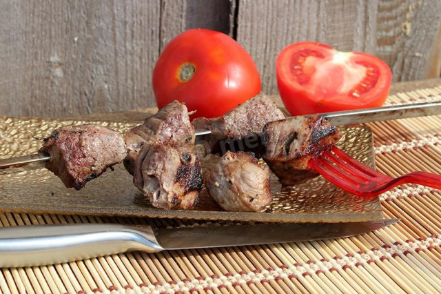 Juicy beef kebab on coals