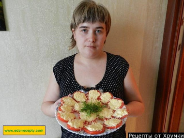 Tomato snack with cheese and garlic filling