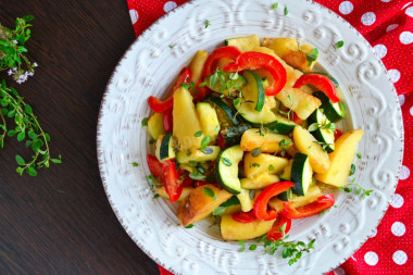 Stewed zucchini with vegetables and potatoes