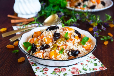 Sweet pilaf with raisins and dried apricots and dried fruits