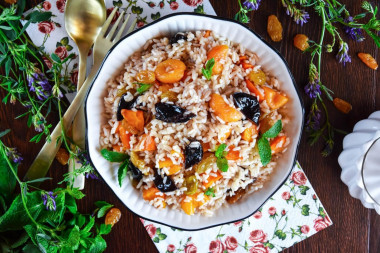 Sweet pilaf with raisins and dried apricots and dried fruits