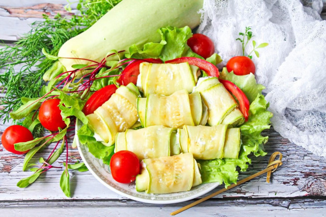 Stuffed zucchini rolls with cheese and garlic