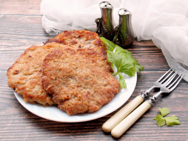 Minced schnitzel in a frying pan