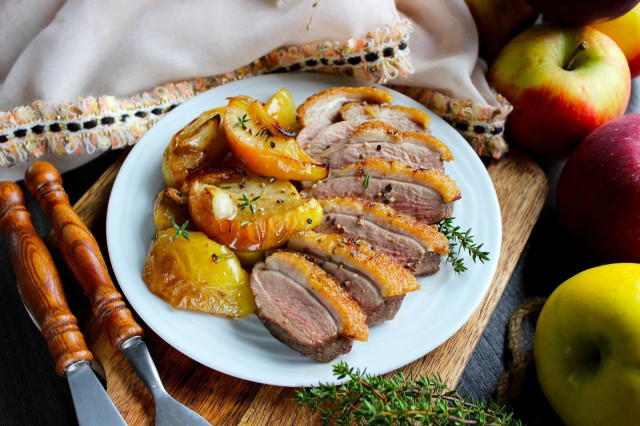 Duck breasts baked in the oven with apples