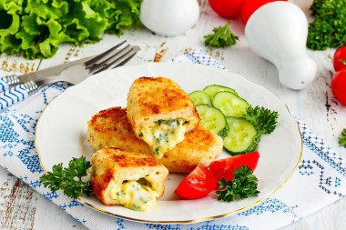 Chicken dishes with cheese in a frying pan