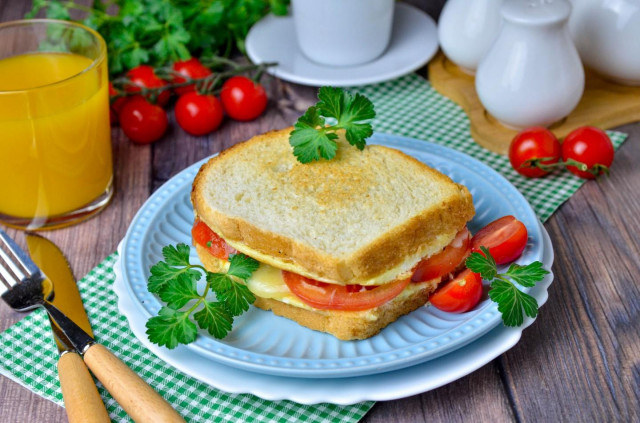 Egg and cheese sandwich in a frying pan