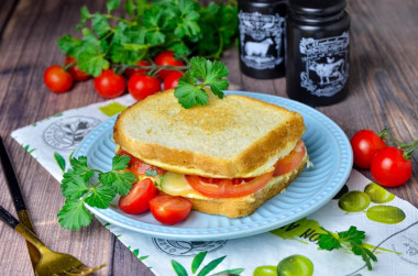 Egg and cheese sandwich in a frying pan