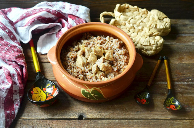 Buckwheat with meat in pots in the oven