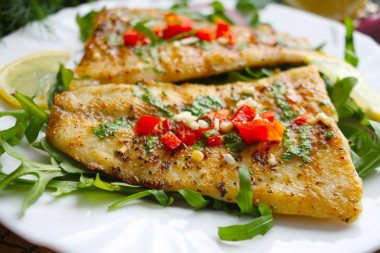 Pangasius fillet in a frying pan