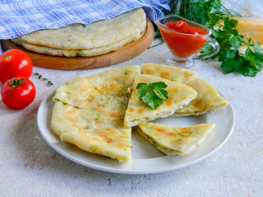 Tortillas with cottage cheese and cheese in a frying pan