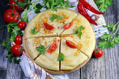 Lazy khachapuri with cottage cheese in a frying pan