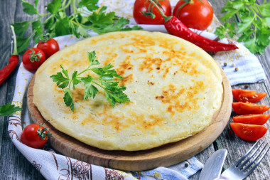 Lazy khachapuri with cottage cheese in a frying pan