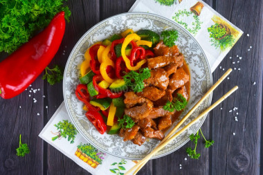 Pork in teriyaki sauce on frying pan