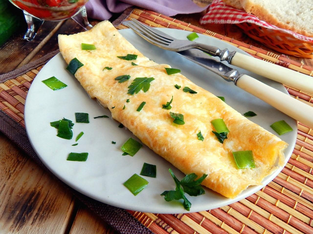 Omelet on water in a frying pan