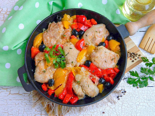 Chicken fillet in flour in a frying pan