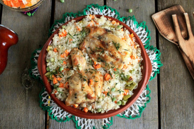 Rice with vegetables and chicken in the oven